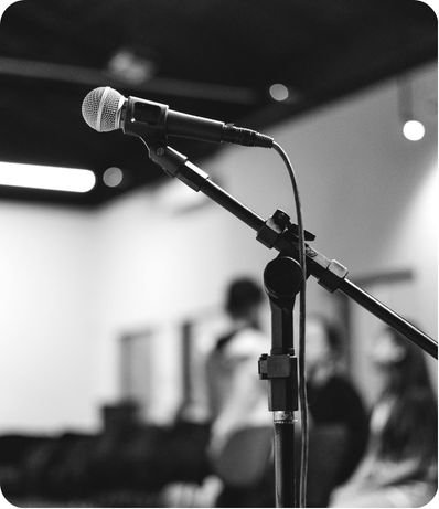 speaker performing live at a corporate event 