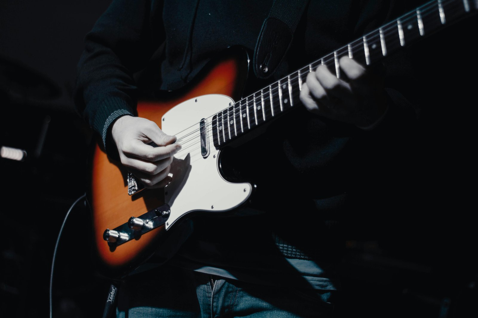guitarist performing live music at a restaurant